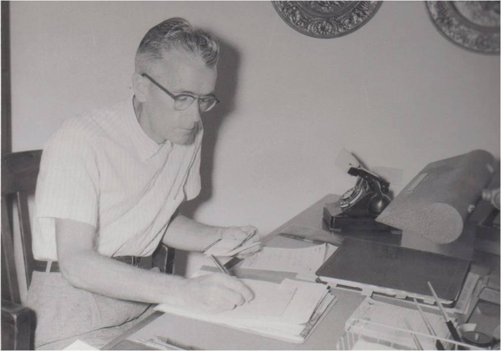 J.Q. Cummings working in the basement of his home.